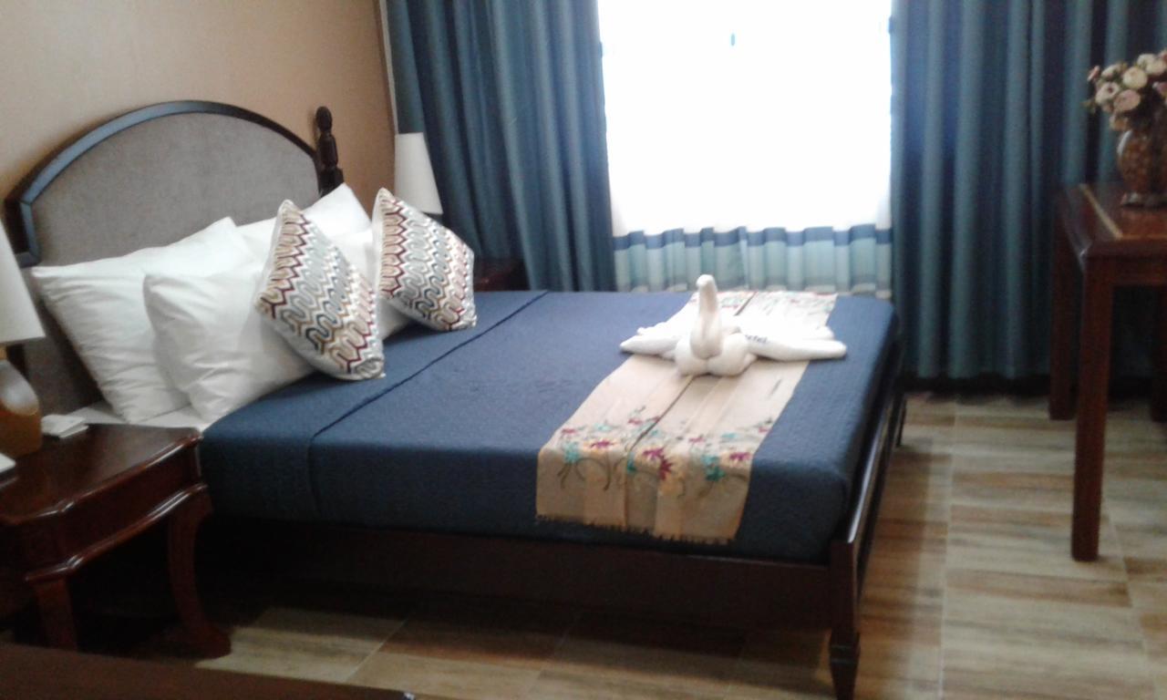 מלון Dumaguete City Charos Dormitel מראה חיצוני תמונה